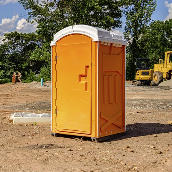 how often are the portable restrooms cleaned and serviced during a rental period in Williamstown